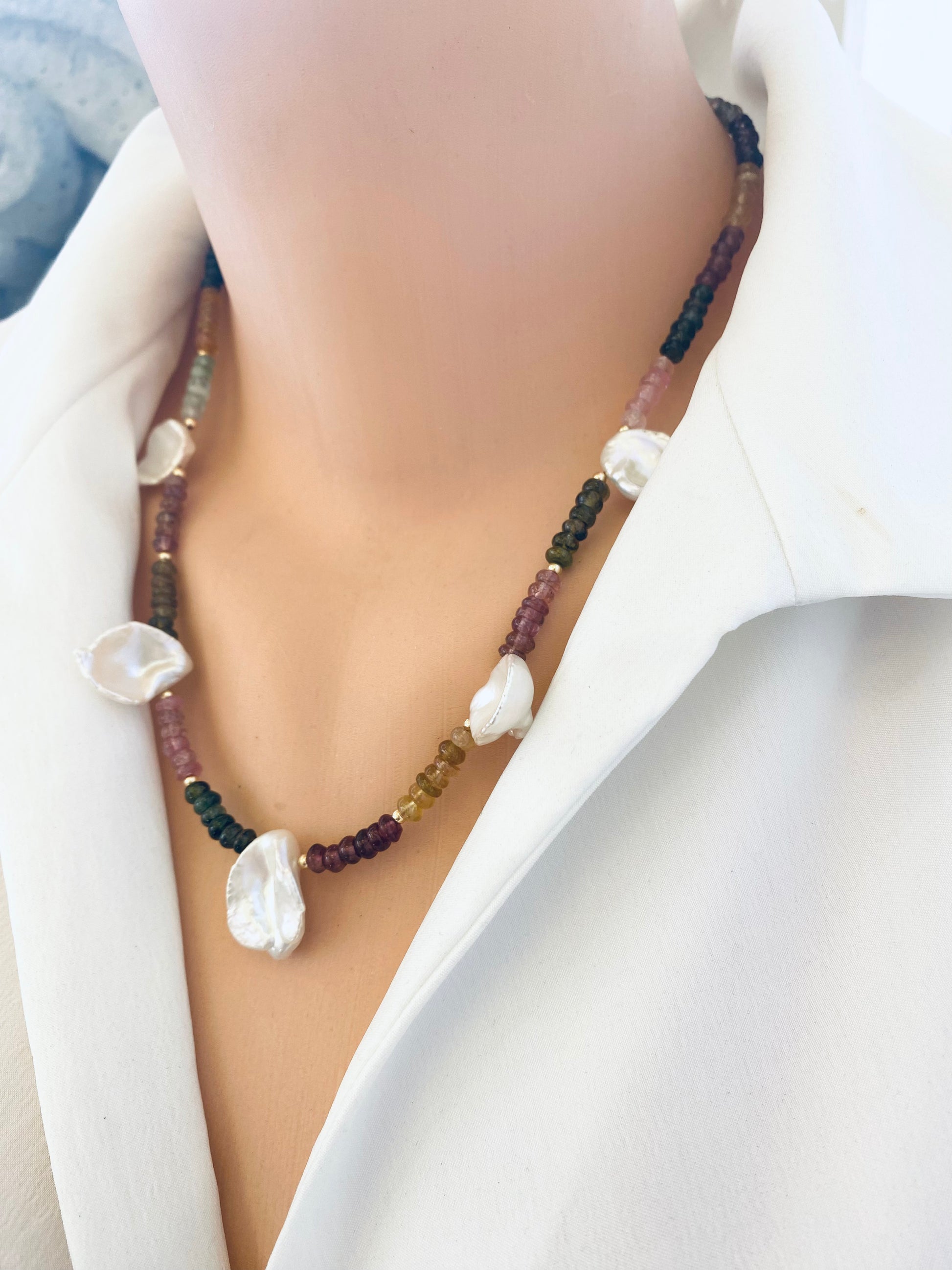 Elegant multi tourmaline and keshi pearl necklace displayed on mannequin, handmade in Canada.