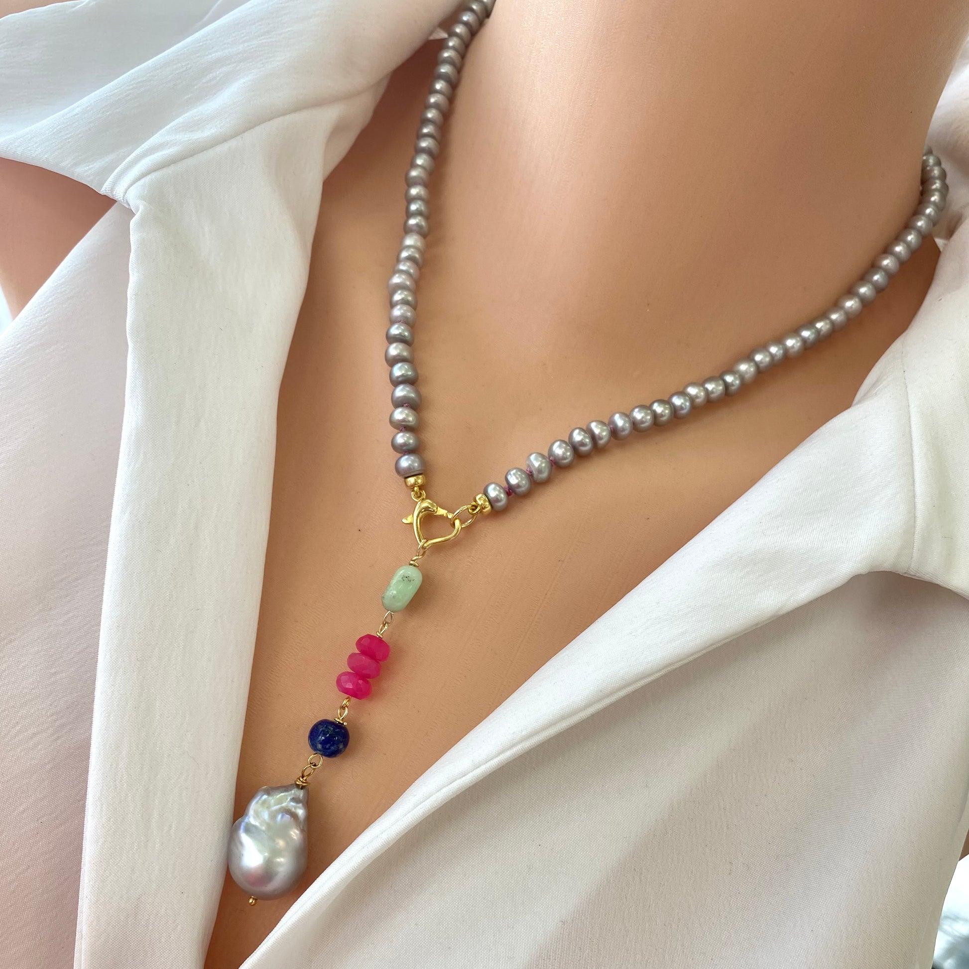 Grey pearl necklace with removable pendant styled as elegant everyday pearl jewelry