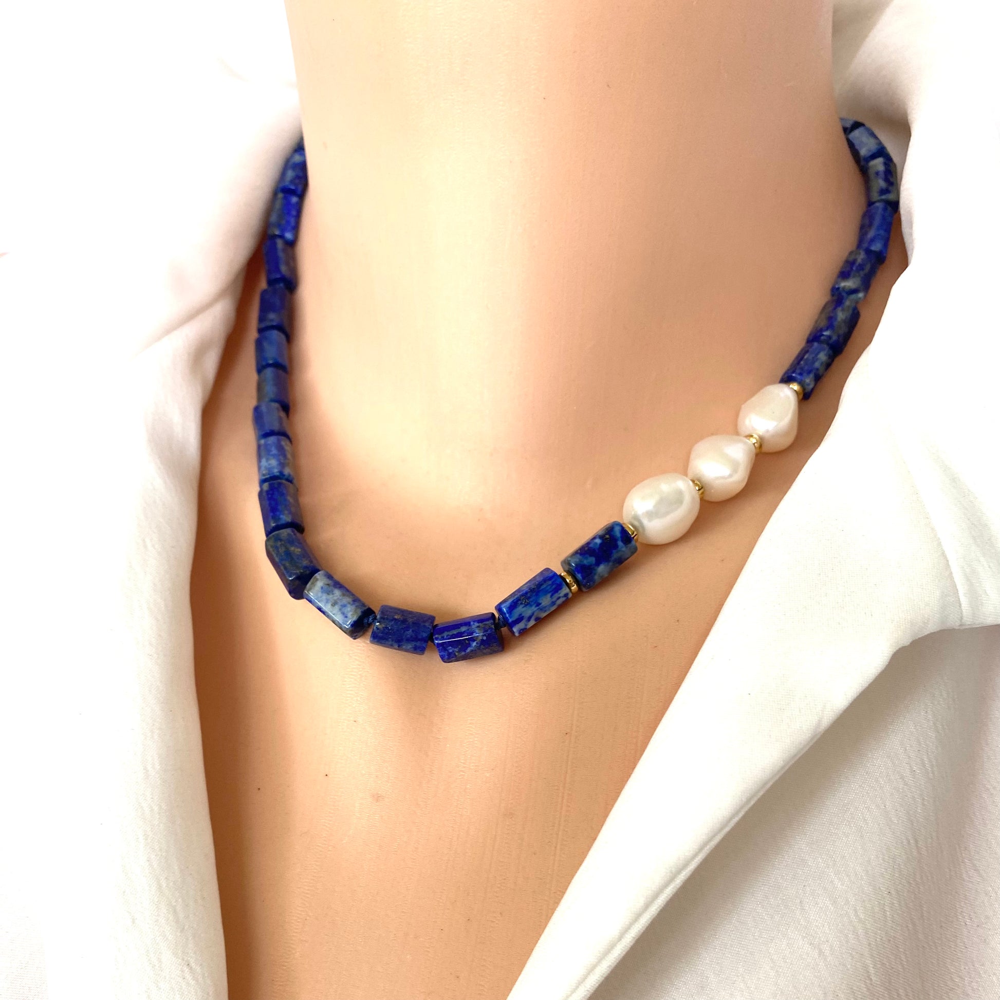 Lapis lazuli pearl necklace close-up on neckline with gold vermeil details, handcrafted in Canada