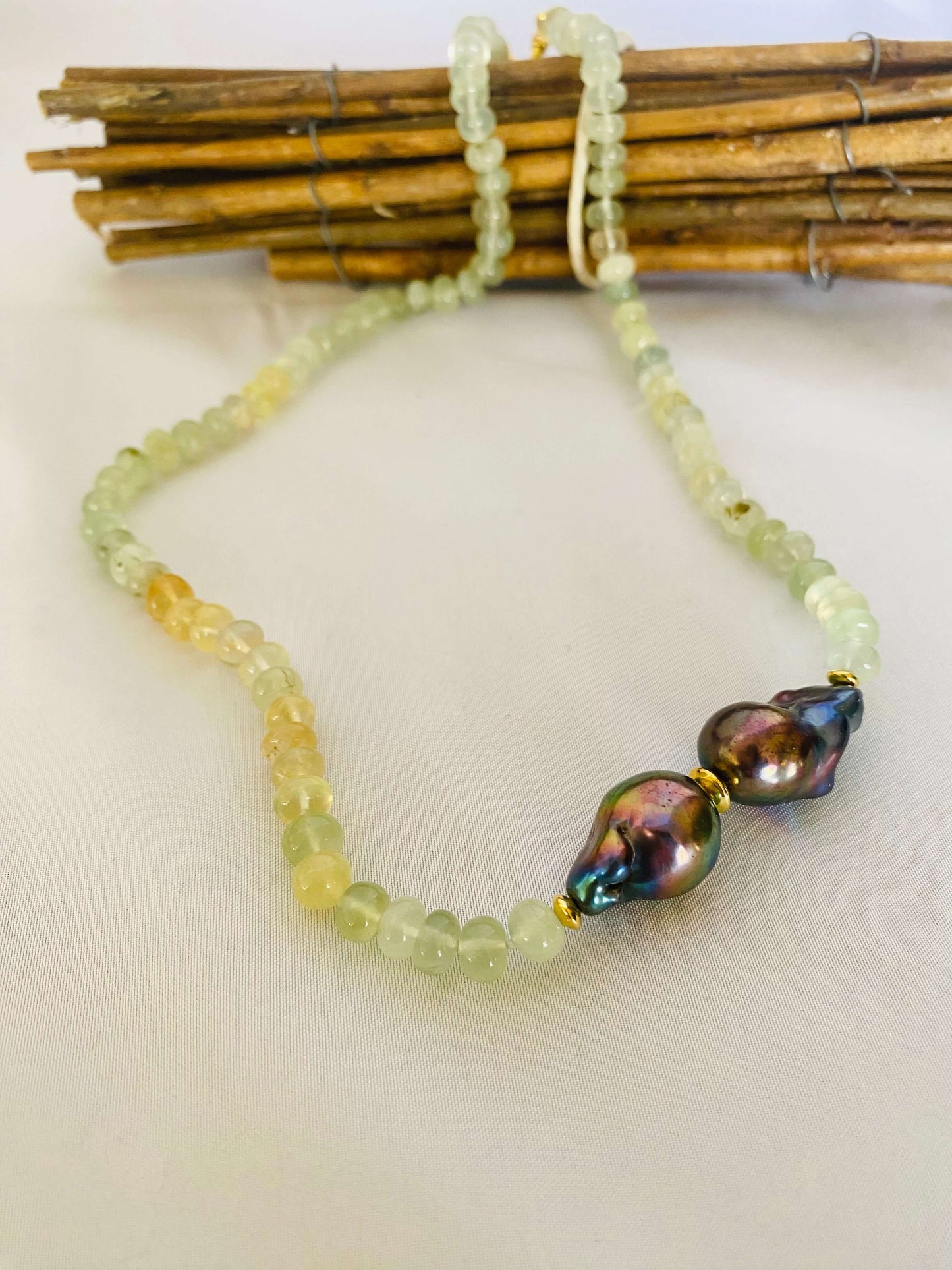 Prehnite and Black Baroque Pearl Necklace | Handcrafted Candy Design featuring green prehnite beads and black baroque pearls.