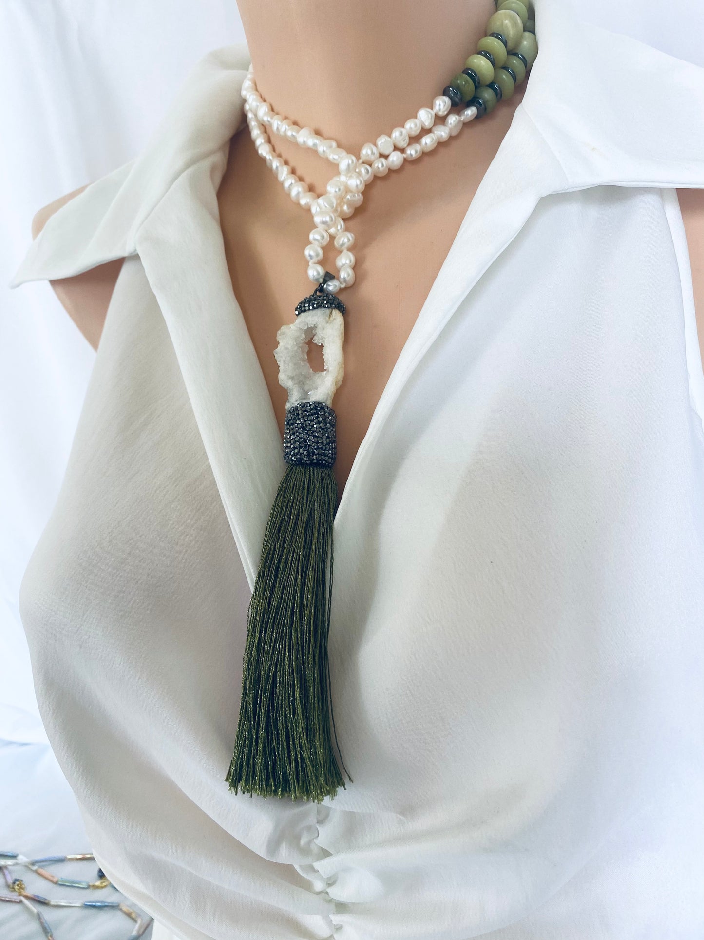 Boho Chic Pearl Tassel Necklace on mannequin — handcrafted pearl, jade, and druzy agate statement jewelry by Loulia Pearl Jewelry