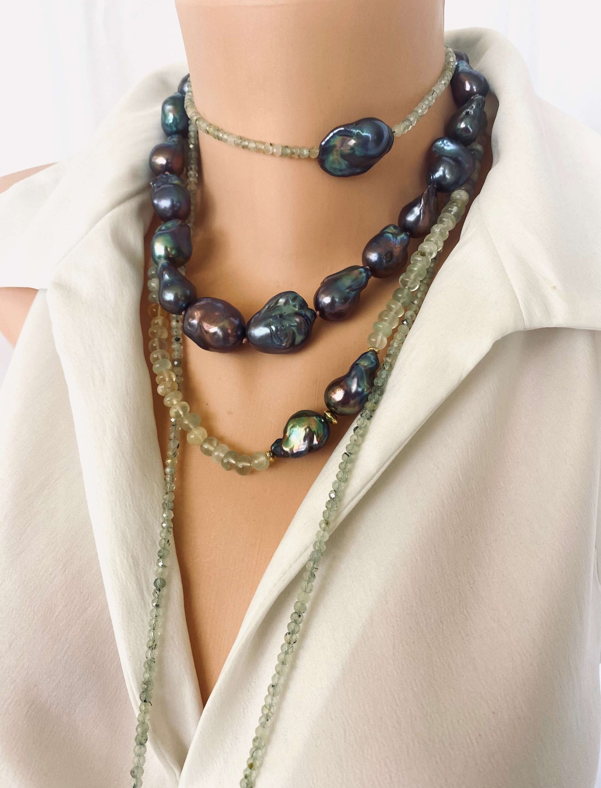 Prehnite and Black Baroque Pearl Necklace showcasing translucent green beads and bold black baroque pearls, handcrafted design.