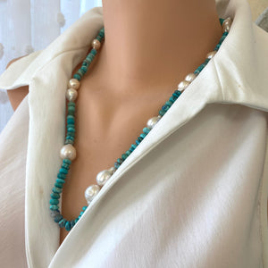 Mannequin wearing a white shirt with a turquoise and pearl beaded necklace.