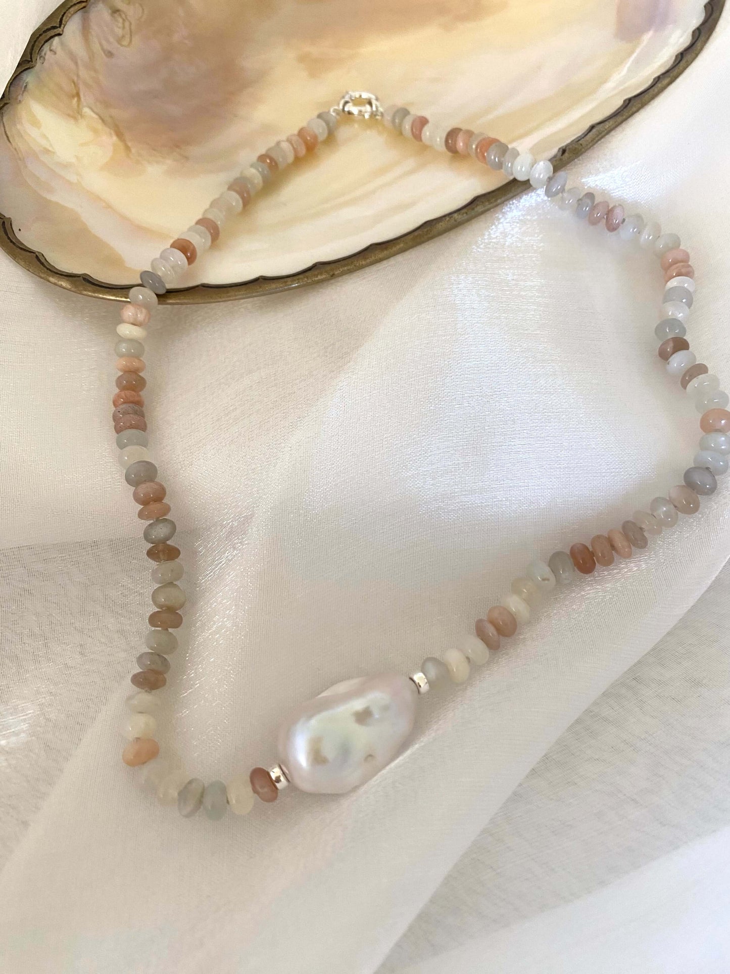 Moonstone and Baroque Pearl Necklace featuring mixed moonstone rondelles and a stunning baroque pearl centerpiece.