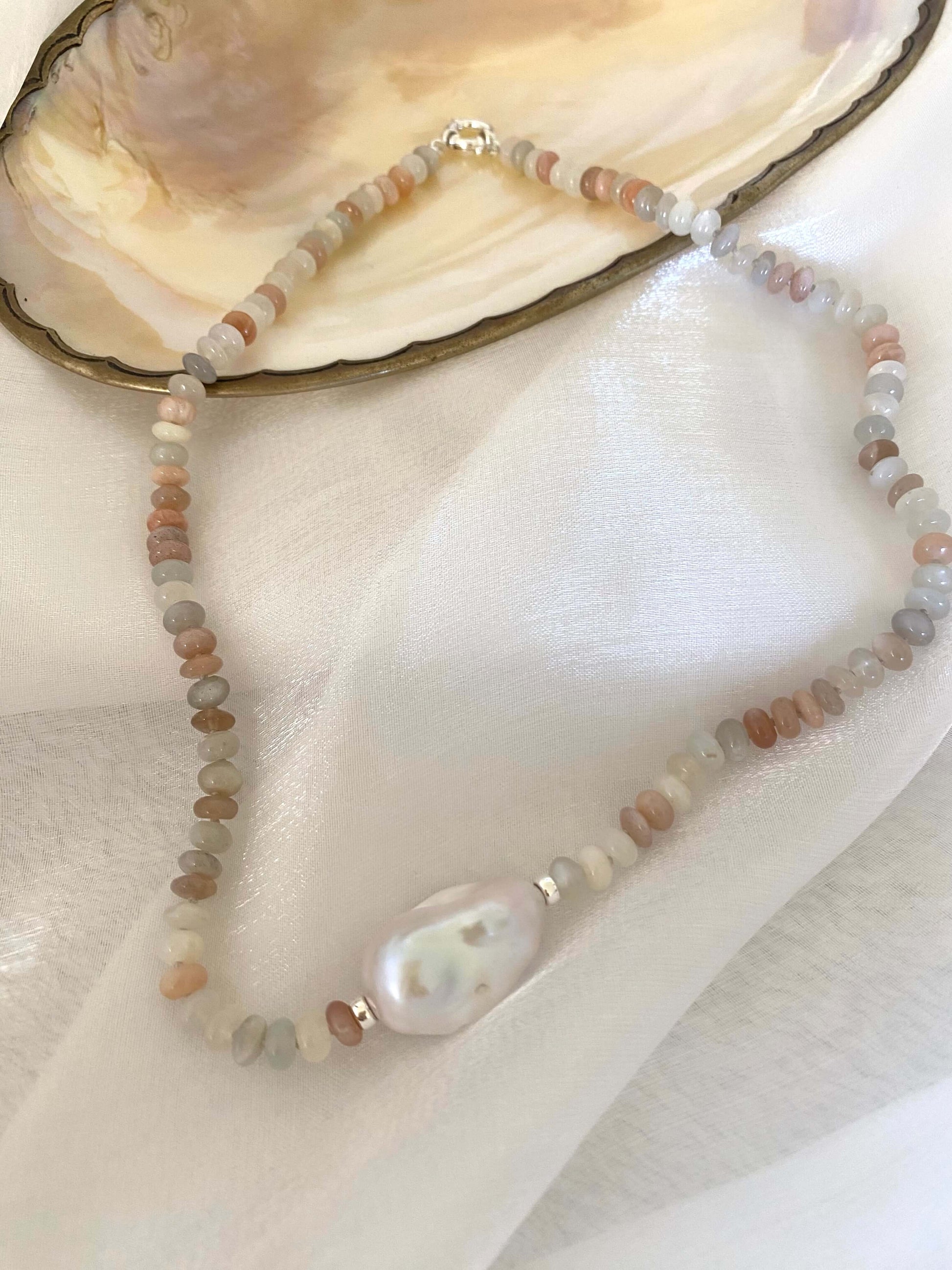 Moonstone and Baroque Pearl Necklace featuring mixed moonstone rondelles and a stunning baroque pearl centerpiece.