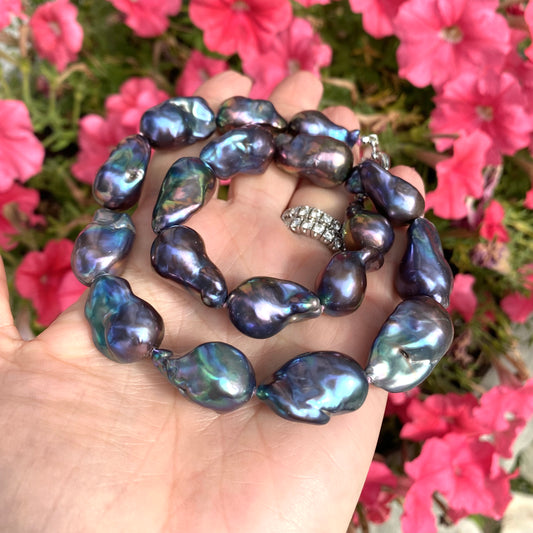 Black Baroque Pearl Necklace showcasing peacock-black freshwater baroque pearls in a chunky design.