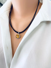 Lade das Bild in den Galerie-Viewer, Side view of black spinel and citrine pendant necklace displayed on mannequin
