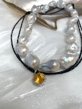 Lade das Bild in den Galerie-Viewer, Black spinel and citrine pendant necklace displayed beside baroque pearl necklace
