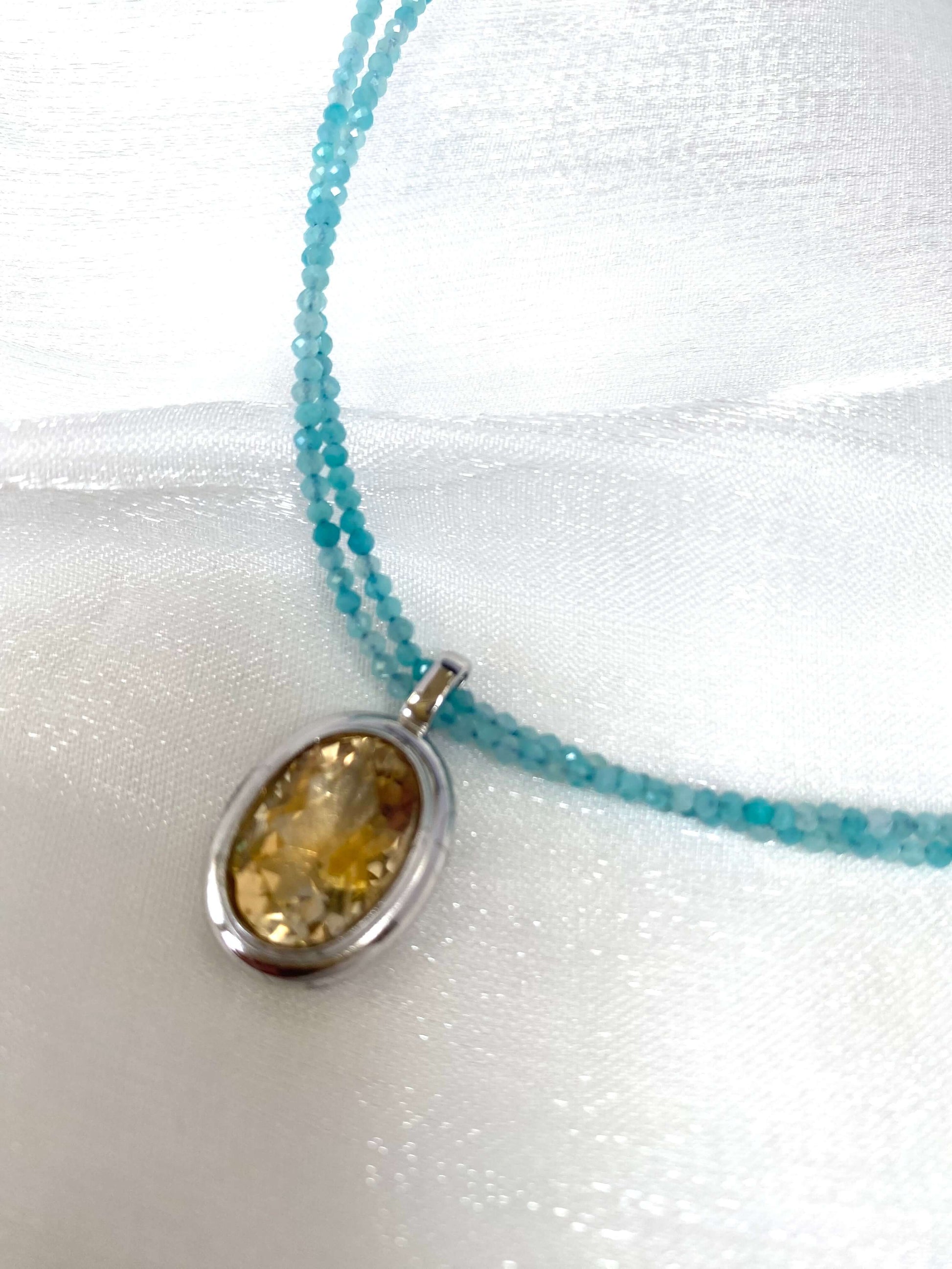 Blue Amazonite Citrine Pendant Necklace showcasing a yellow citrine gemstone pendant and double-strand design.
