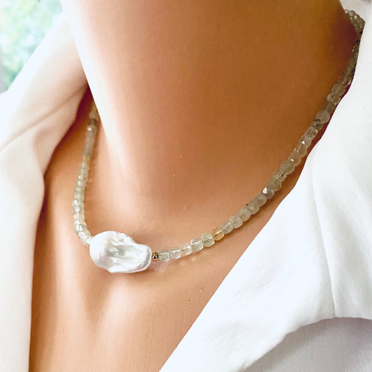 Prehnite necklace featuring light green prehnite faceted cubes and a baroque pearl, showcasing elegant craftsmanship.