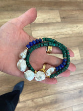 Cargar imagen en el visor de la galería, Malachite Lapis Lazuli Baroque Pearl Necklace viewed from top in hand, handmade gemstone jewelry from Canada.
