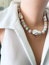 Charger l&#39;image dans la galerie, Close-up angled view of morganite and jade necklace with baroque pearls on mannequin, showing soft pink and green gemstones.
