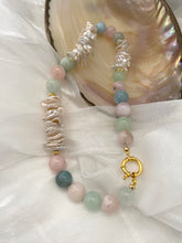 Charger l&#39;image dans la galerie, Aquamarine Morganite Necklace – displayed on white cloth with pearl shell

