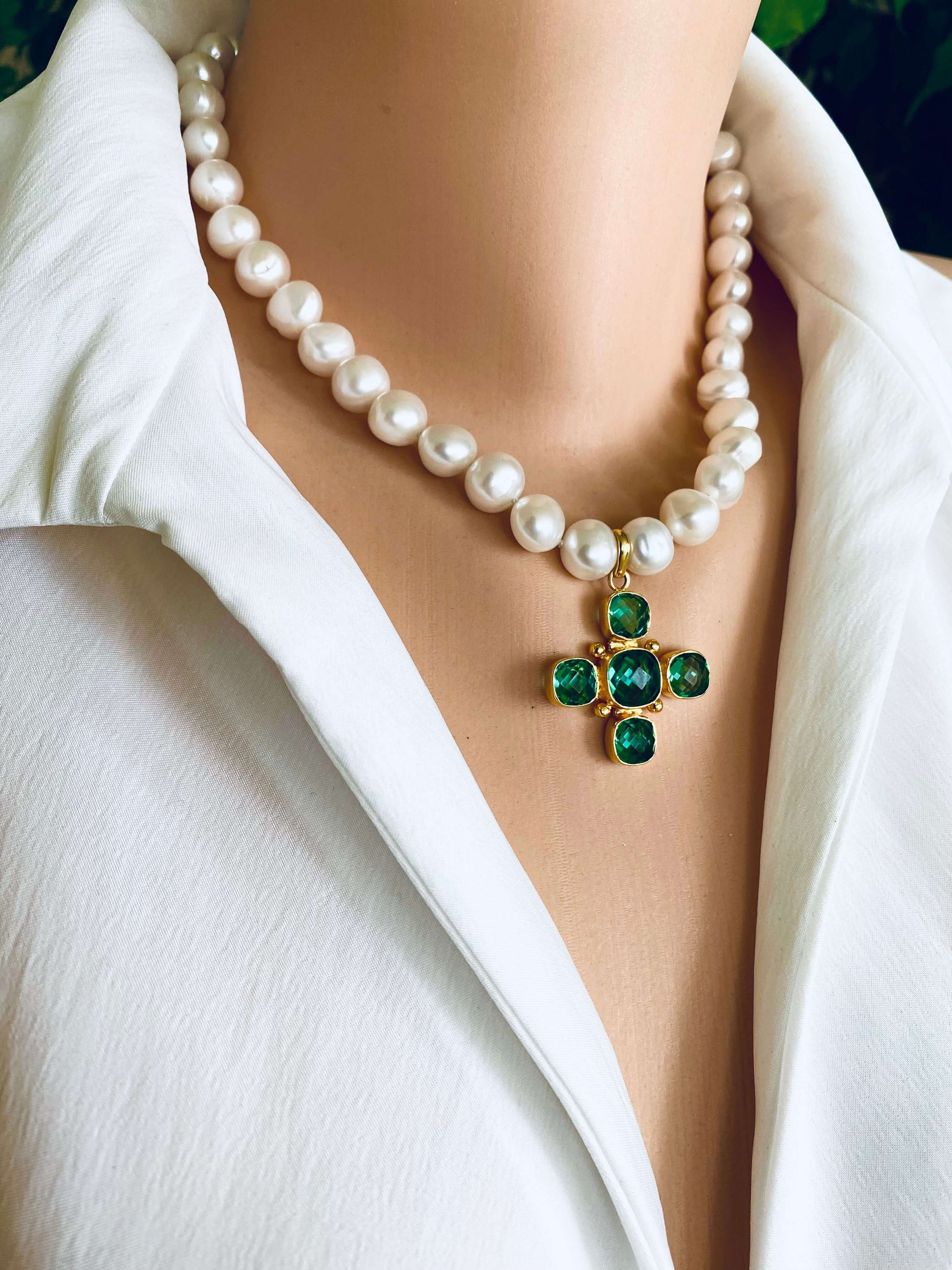 Potato pearl necklace with cross pendant displaying luminous white pearls and a gold plated Green Quartz cross.