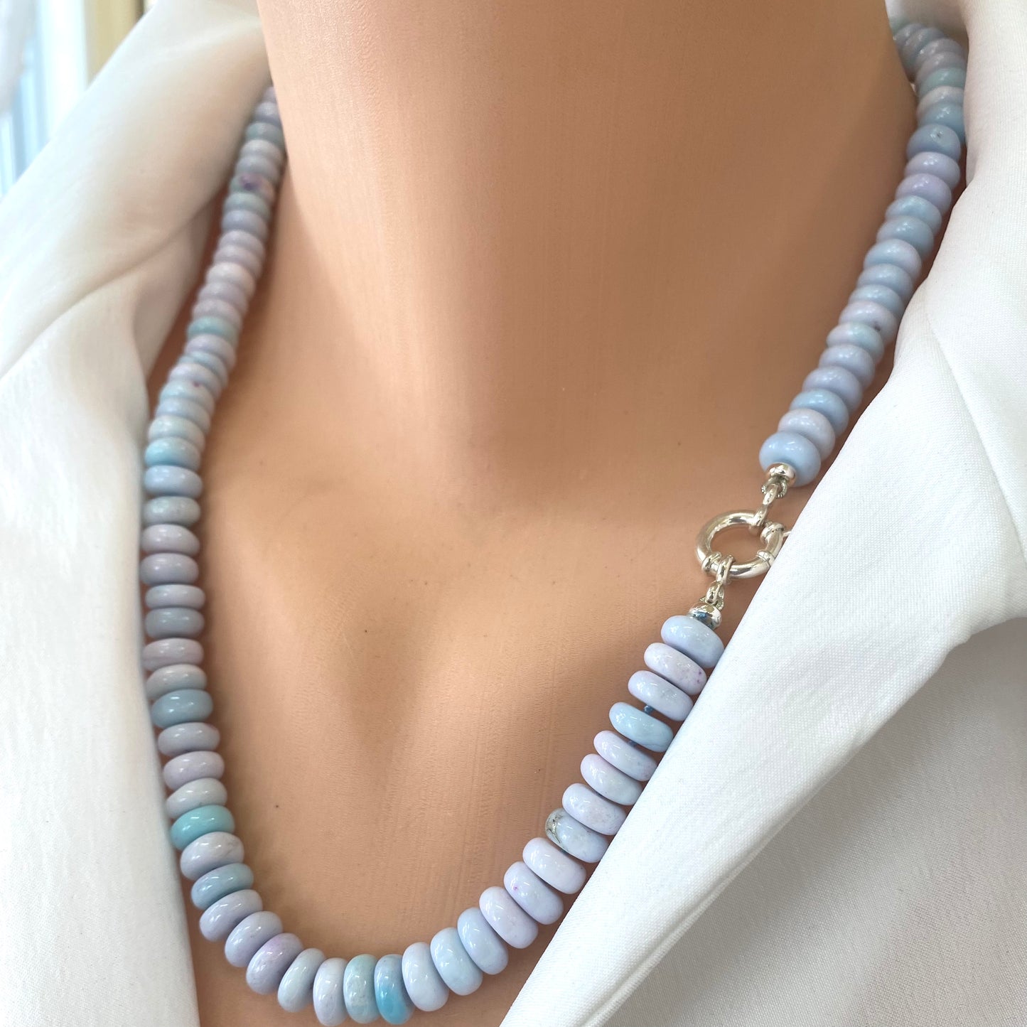 Opal candy necklace in pinkish blue tones featuring pastel rondelle beads, showcasing calming colors and handcrafted beauty.