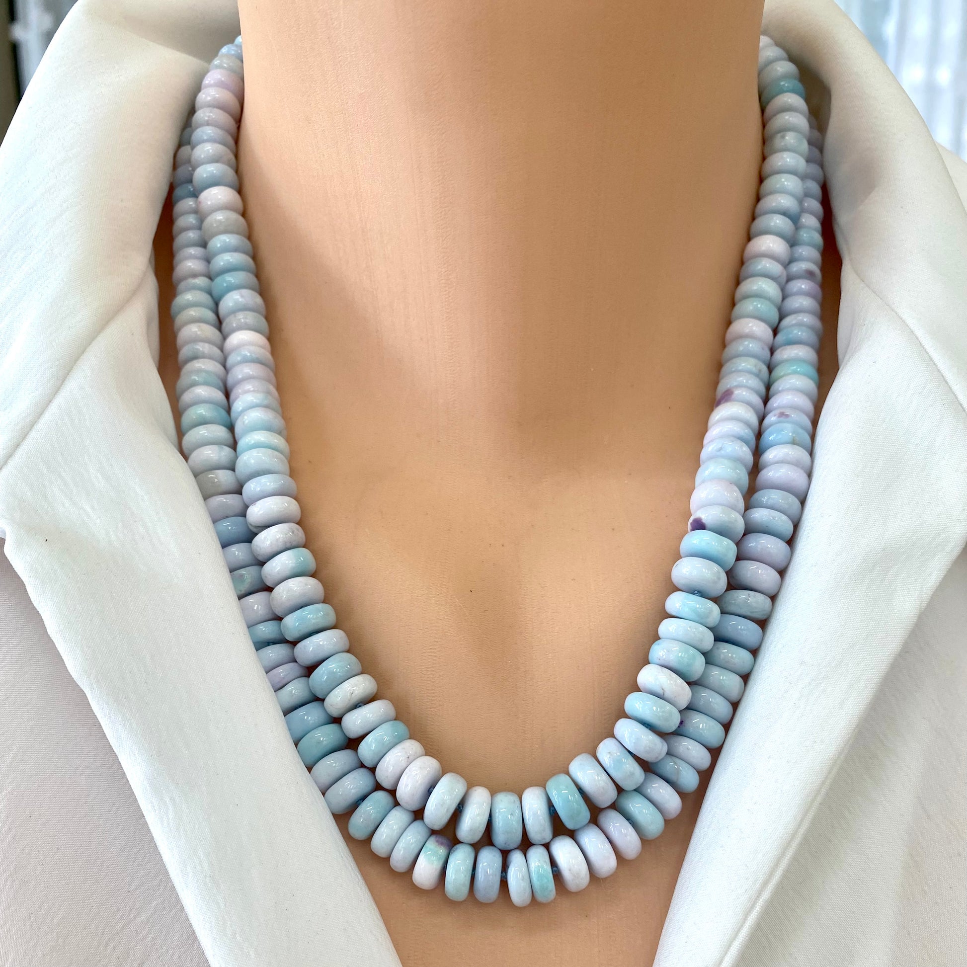 Opal candy necklace in pinkish blue tones, featuring handcrafted rondelle beads in pastel blush and sky-blue colors.