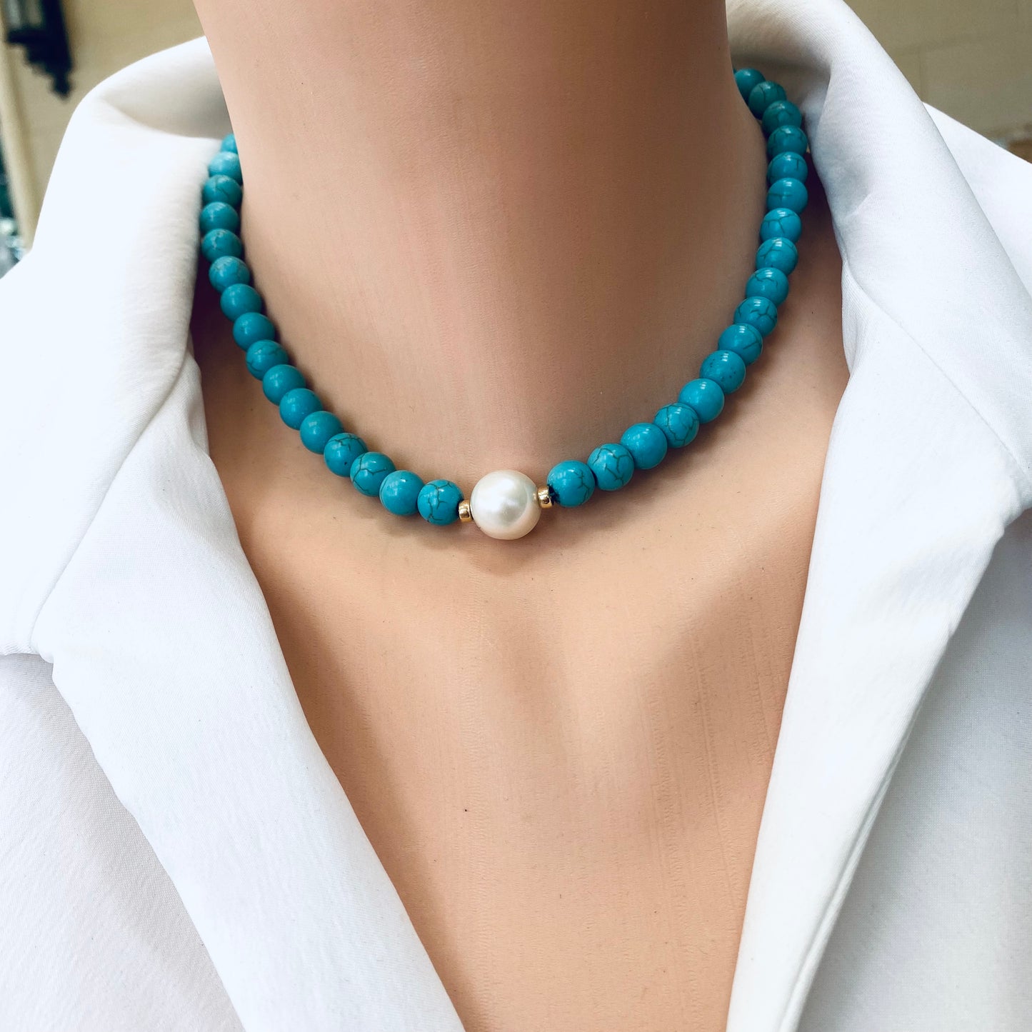 Turquoise howlite pearl choker necklace worn alone for a clean modern look