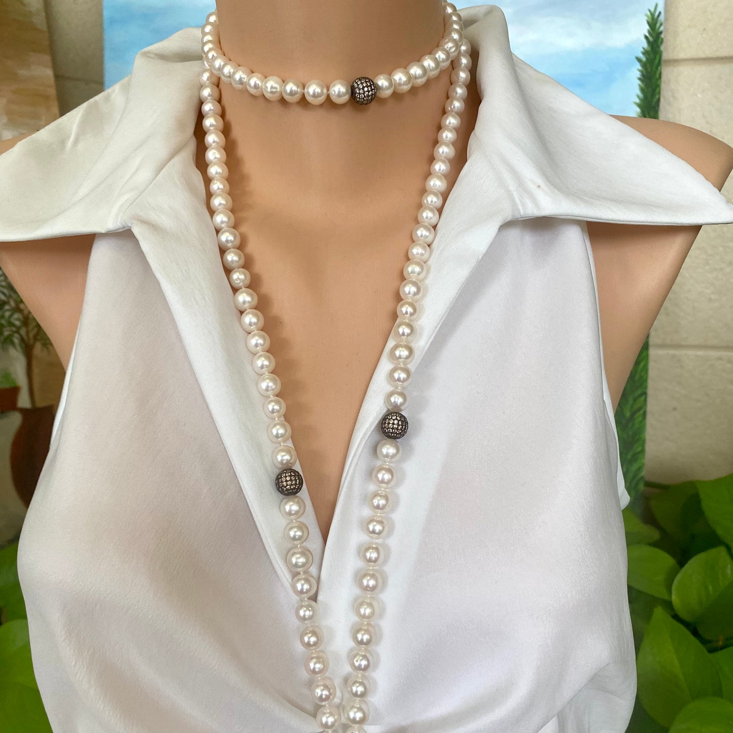 Freshwater pearl necklace on mannequin, 55 inch CZ pave silver sautoir designed and handmade in Canada.