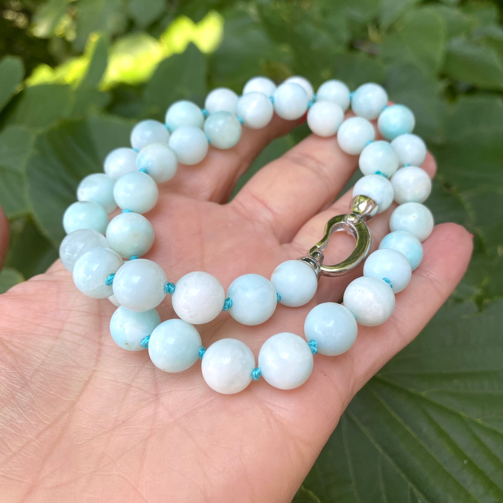 Light blue hemimorphite candy necklace close-up showing smooth AAA+ hemimorphite beads