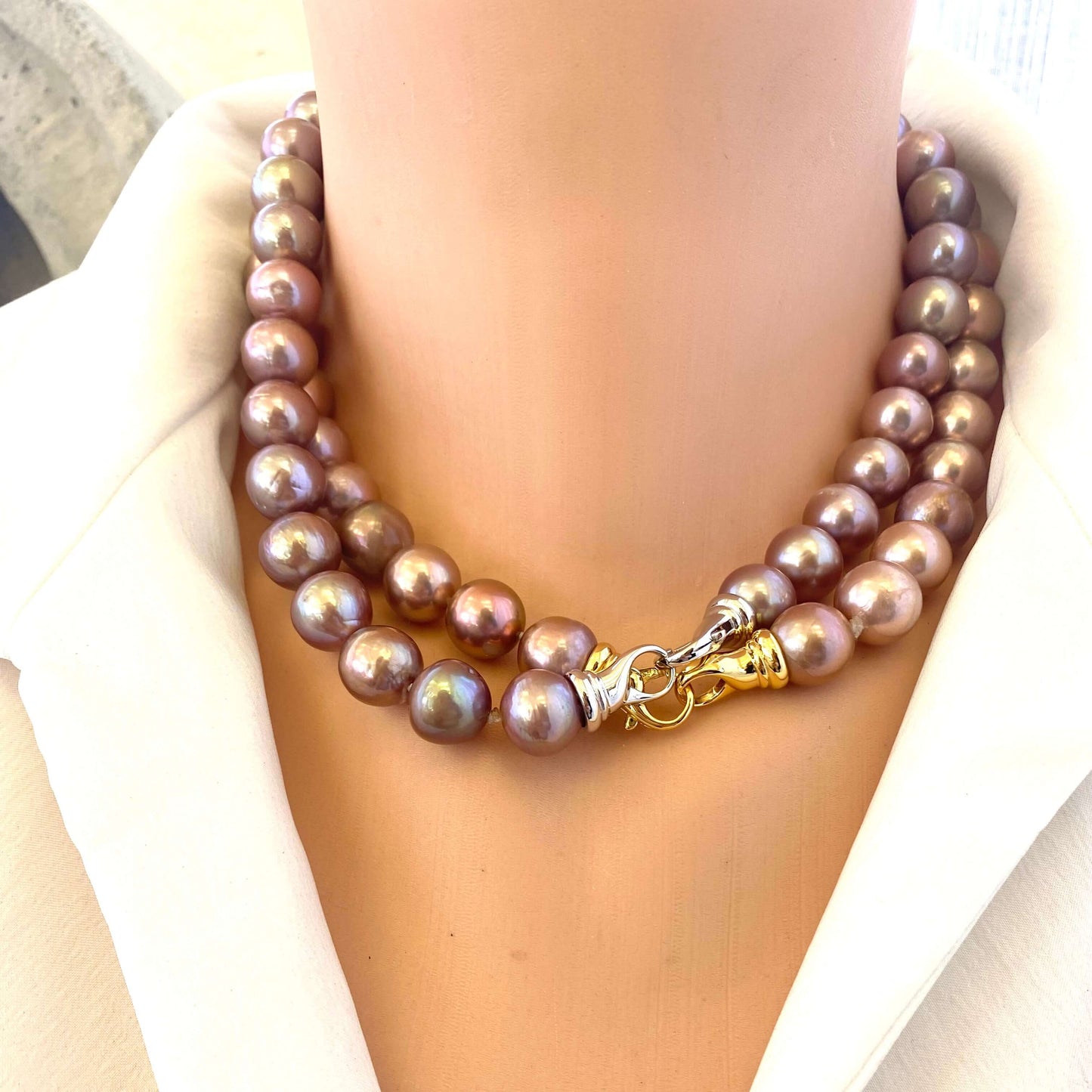Metallic Edison Pearl Necklace showcasing large, shimmering pearls with a bold handcrafted design.