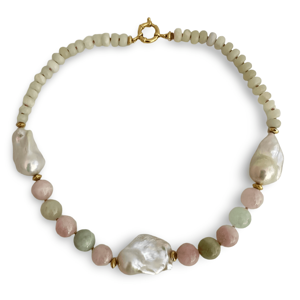 A beaded necklace featuring large, irregular white baroque pearls accented by small large beads in pale pink, sage green, and cream, finished with a gold clasp on a white background.