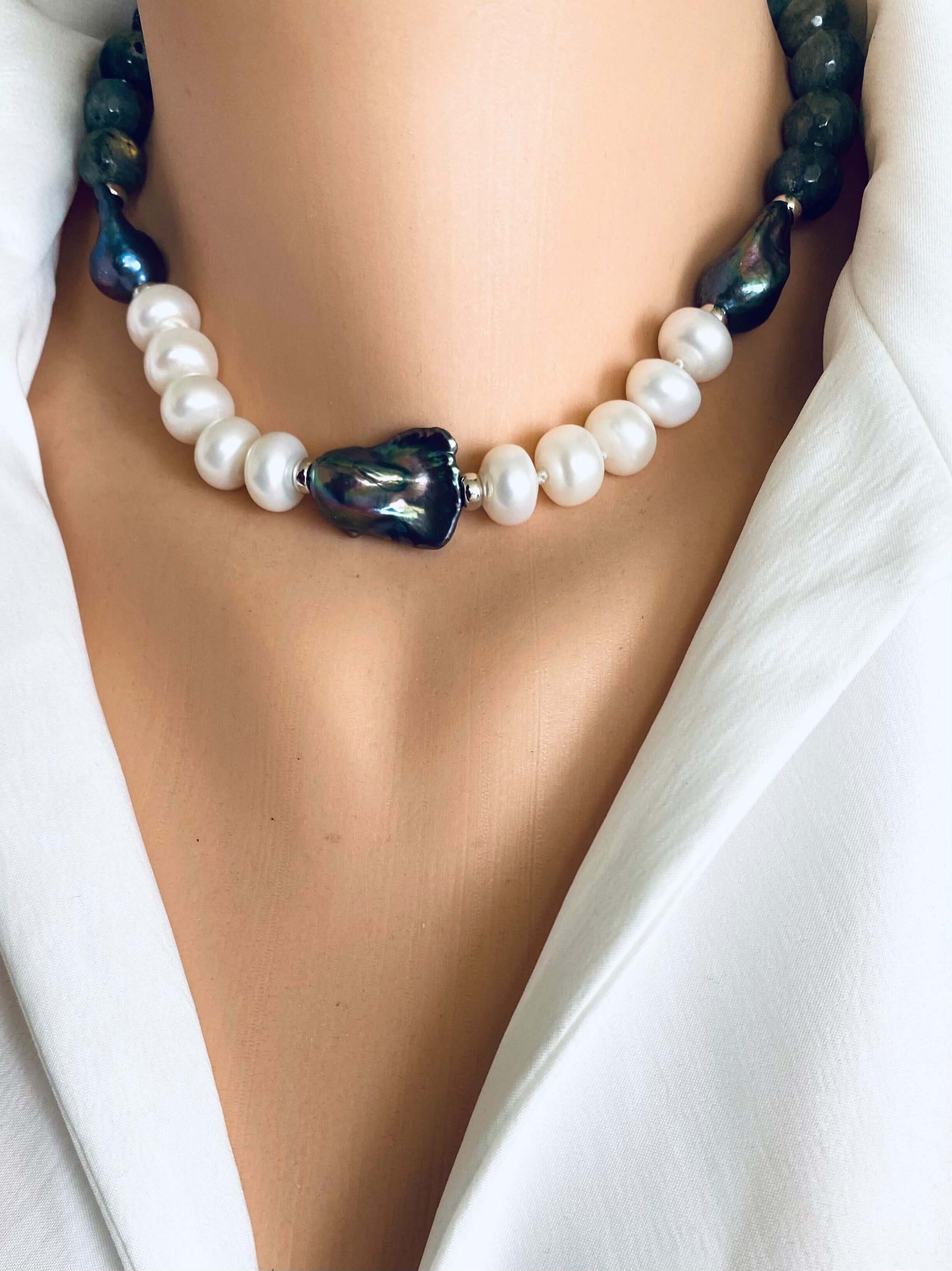 Labradorite pearl necklace with baroque and coin pearls on a mannequin, showcasing its organic elegance.
