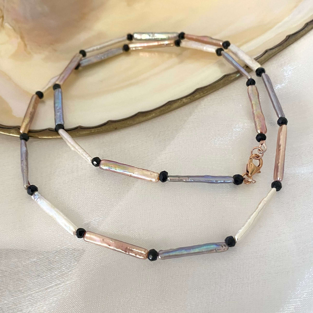 Pastel Stick Pearl Necklace featuring stick pearls in pastel colors with black spinel accents, handcrafted design.
