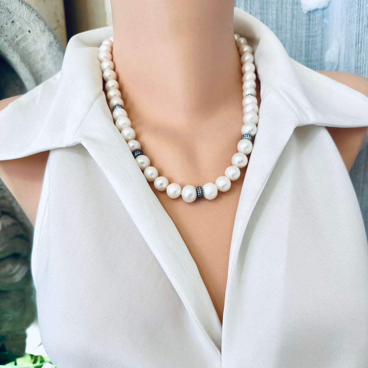 Pearl necklace with zircon pave beads, handmade in Canada, showcasing freshwater pearls and silver accents.
