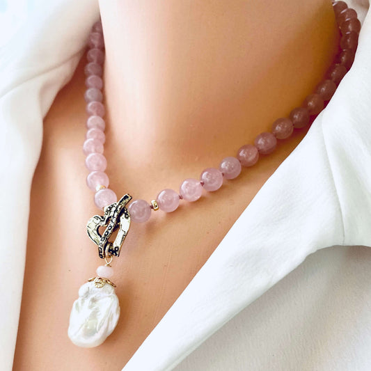 Rose quartz pearl necklace on mannequin showing baroque pearl pendant