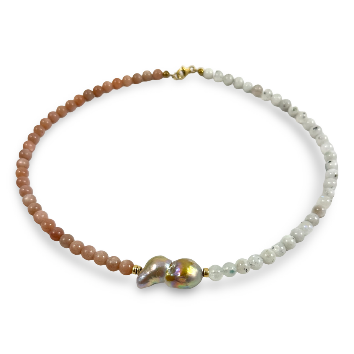 A beaded necklace featuring a warm brown gradient on one side, white baroque pearls on the other, and a large iridescent baroque pearl pendant in the center, finished with gold-toned hardware.