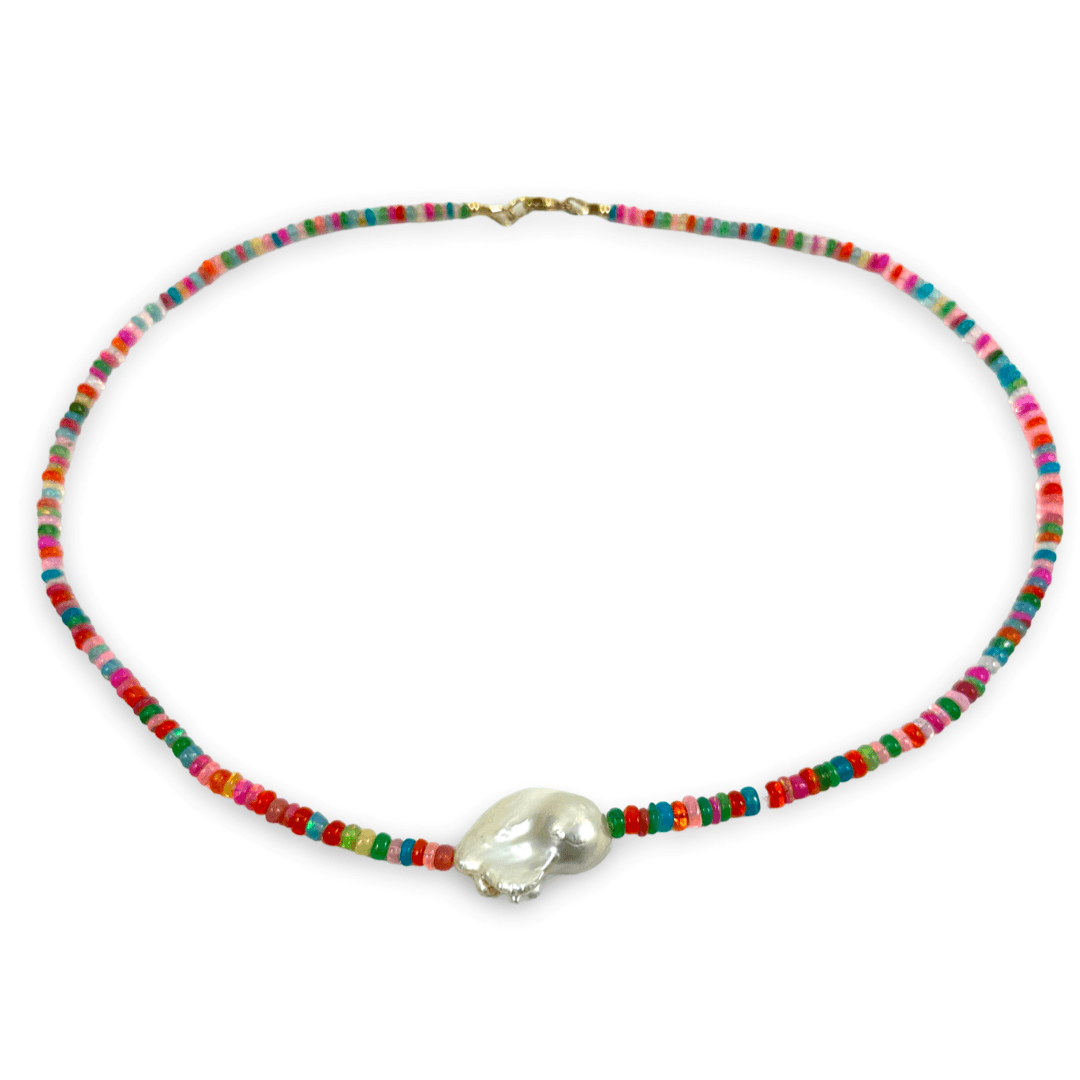A beaded necklace featuring a central white baroque pearl pendant, with small colorful beads in red, green, blue, pink, and orange along the chain, displayed on a clean white background.
