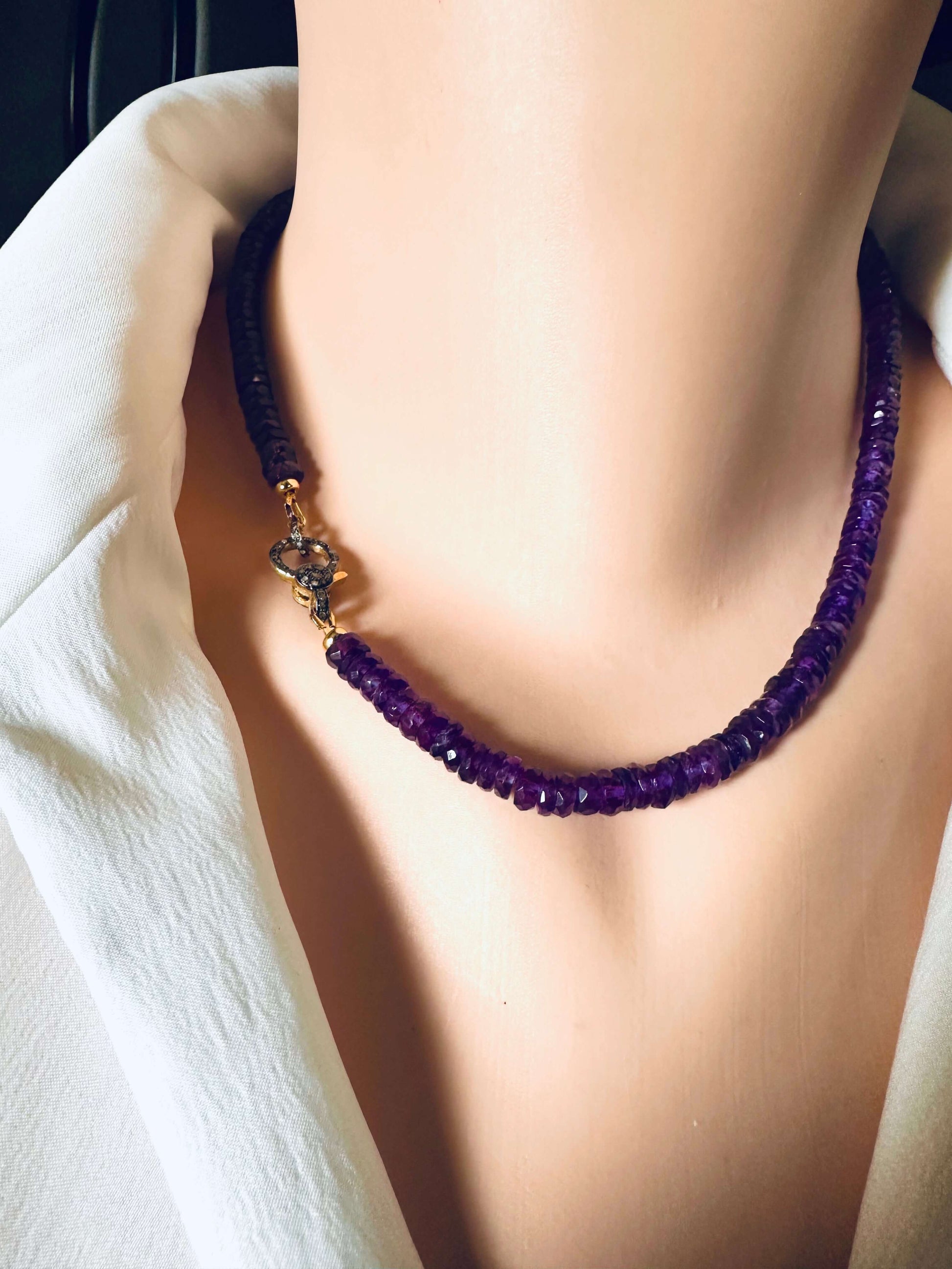 Purple Amethyst Gemstone Necklace with Diamond Pavé Gold Vermeil Clasp showcased on a mannequin's neck.