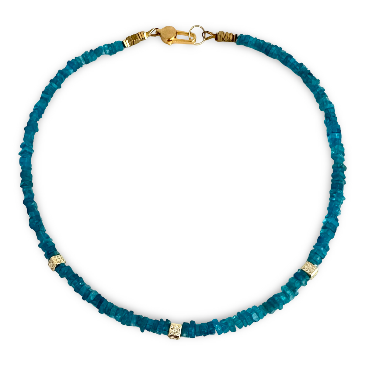 A beaded necklace made of small, irregular teal-blue stone chips, accented with three gold spacer beads and a gold lobster clasp, shown on a plain white background.