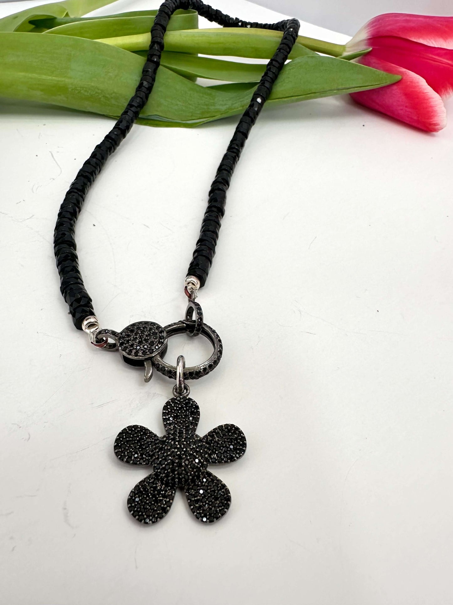 Black Spinel Daisy Pendant Necklace in Oxidized Silver – 18” featuring black spinel beads and toggle clasp.
