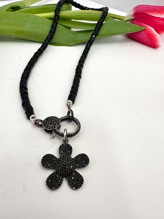 Black Spinel Daisy Pendant Necklace in Oxidized Silver – 18” featuring black spinel beads and toggle clasp.