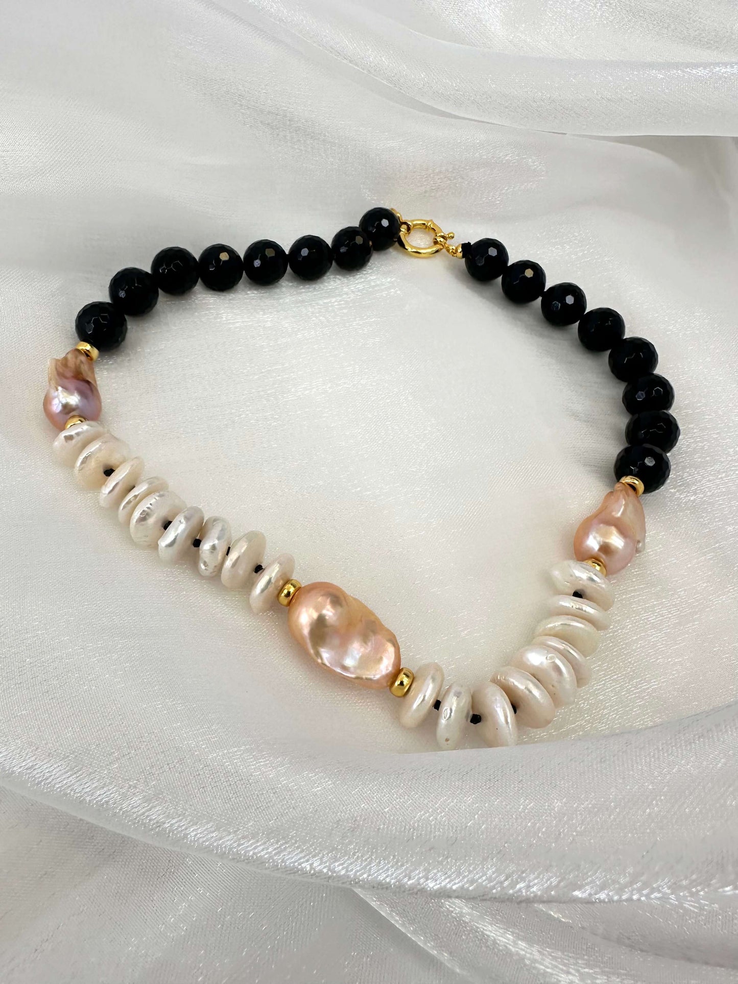 Baroque pearl necklace with black tourmaline, golden pink baroque pearls and off white coin pearls