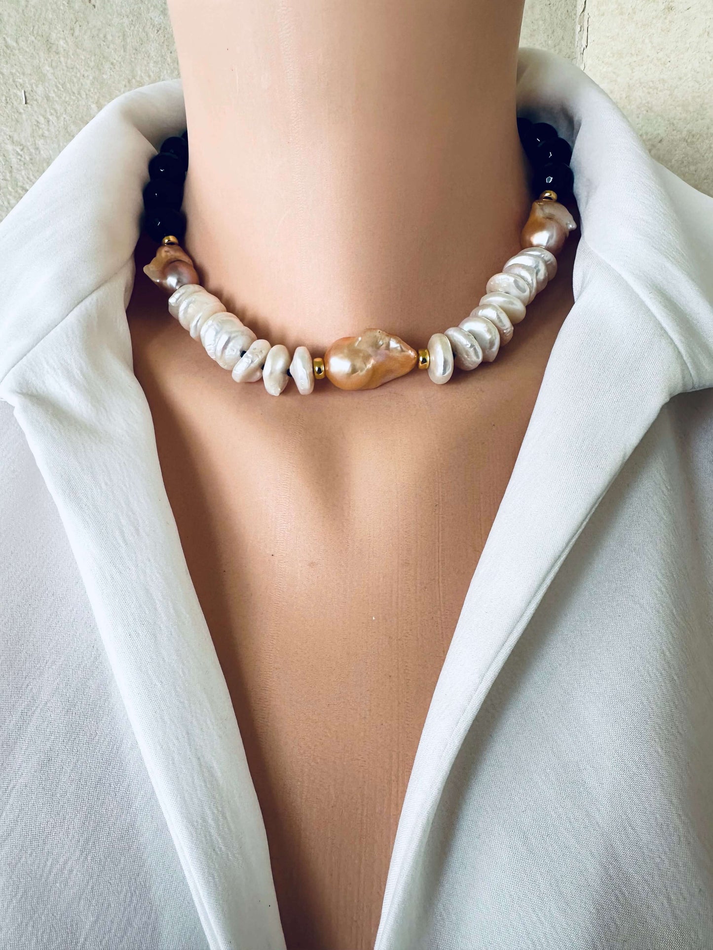 Baroque pearl necklace with black tourmaline worn at collarbone, 17 inch statement design