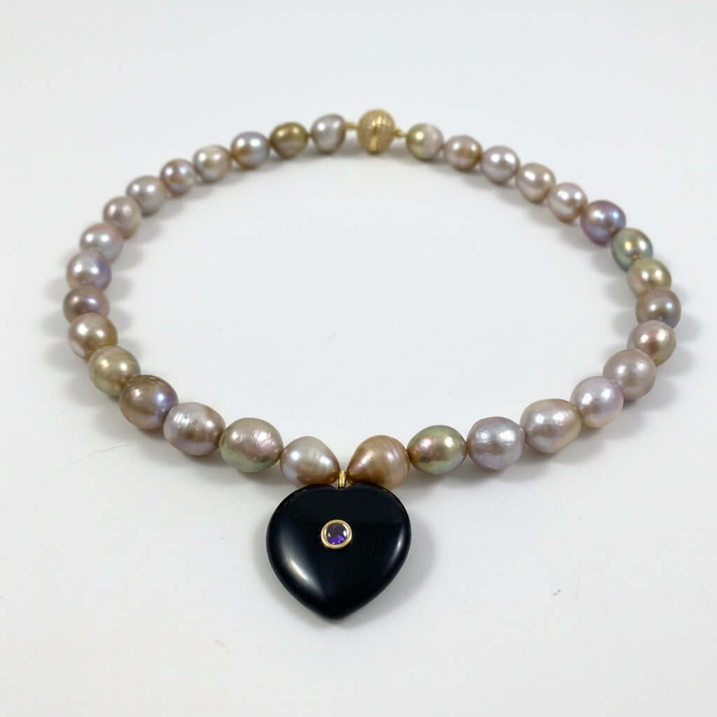 freshwater golden pearl necklace with black obsidian heart and cz pave magnetic clasp