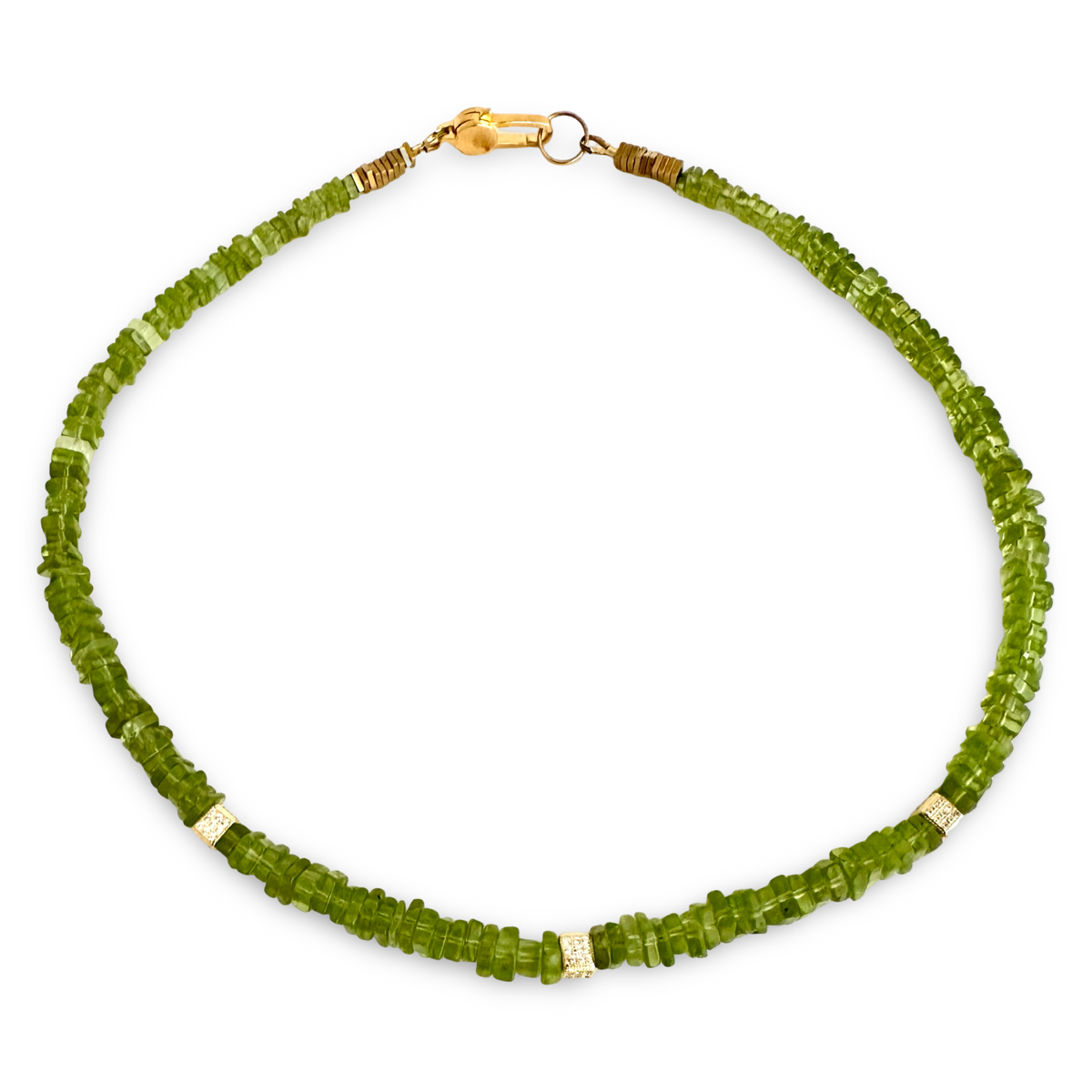 A beaded necklace made of small green faceted gemstone chips, accented with gold spacer beads and a gold clasp, shown on a plain white background.
