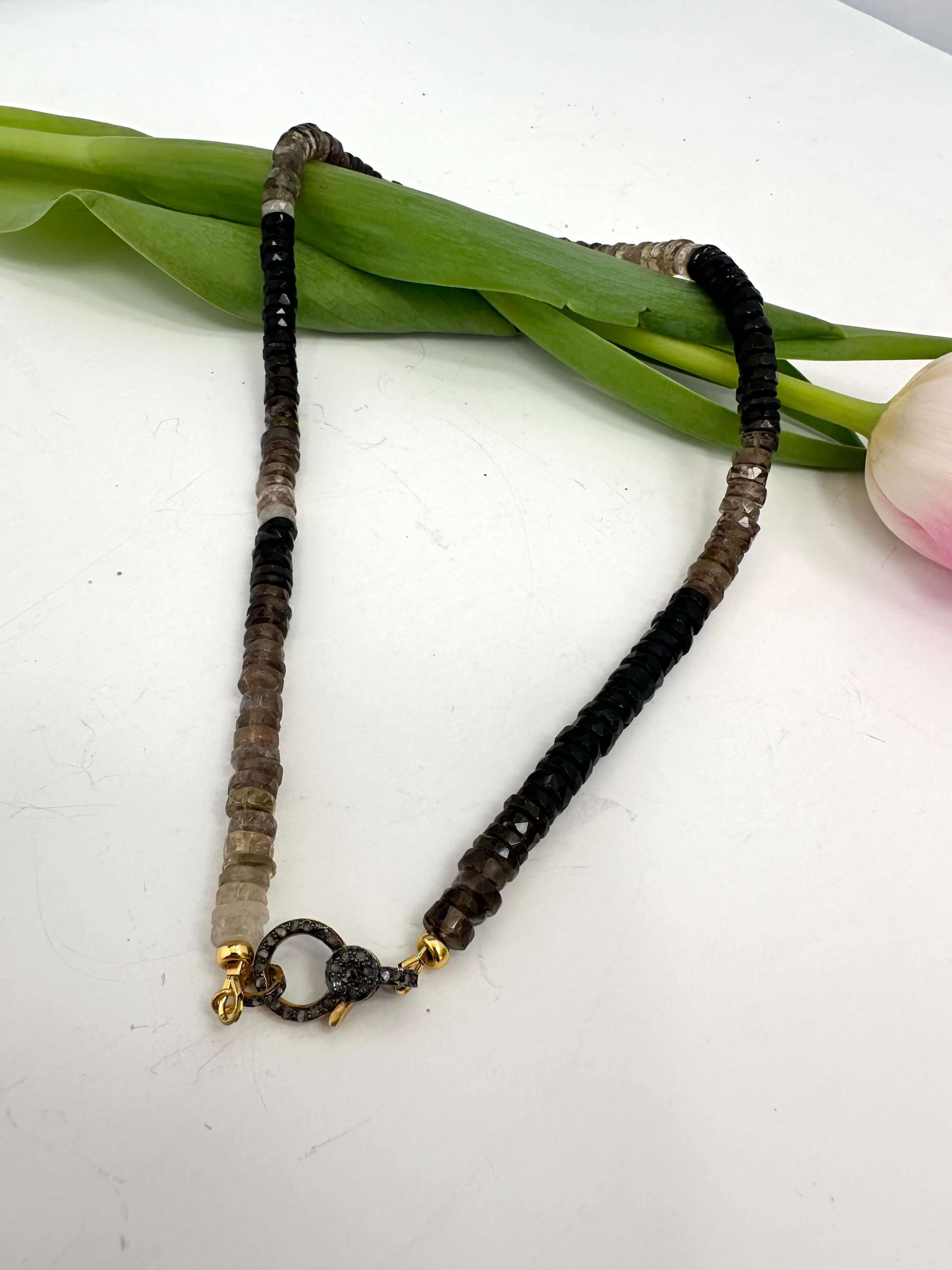Smoky quartz necklace with pavé clasp in gold vermeil, featuring faceted Indian-cut heishi beads, 17.5 inches long.