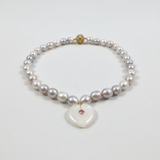greyish white freshwater pearl choker with a heart pendant and magnetic clasp
