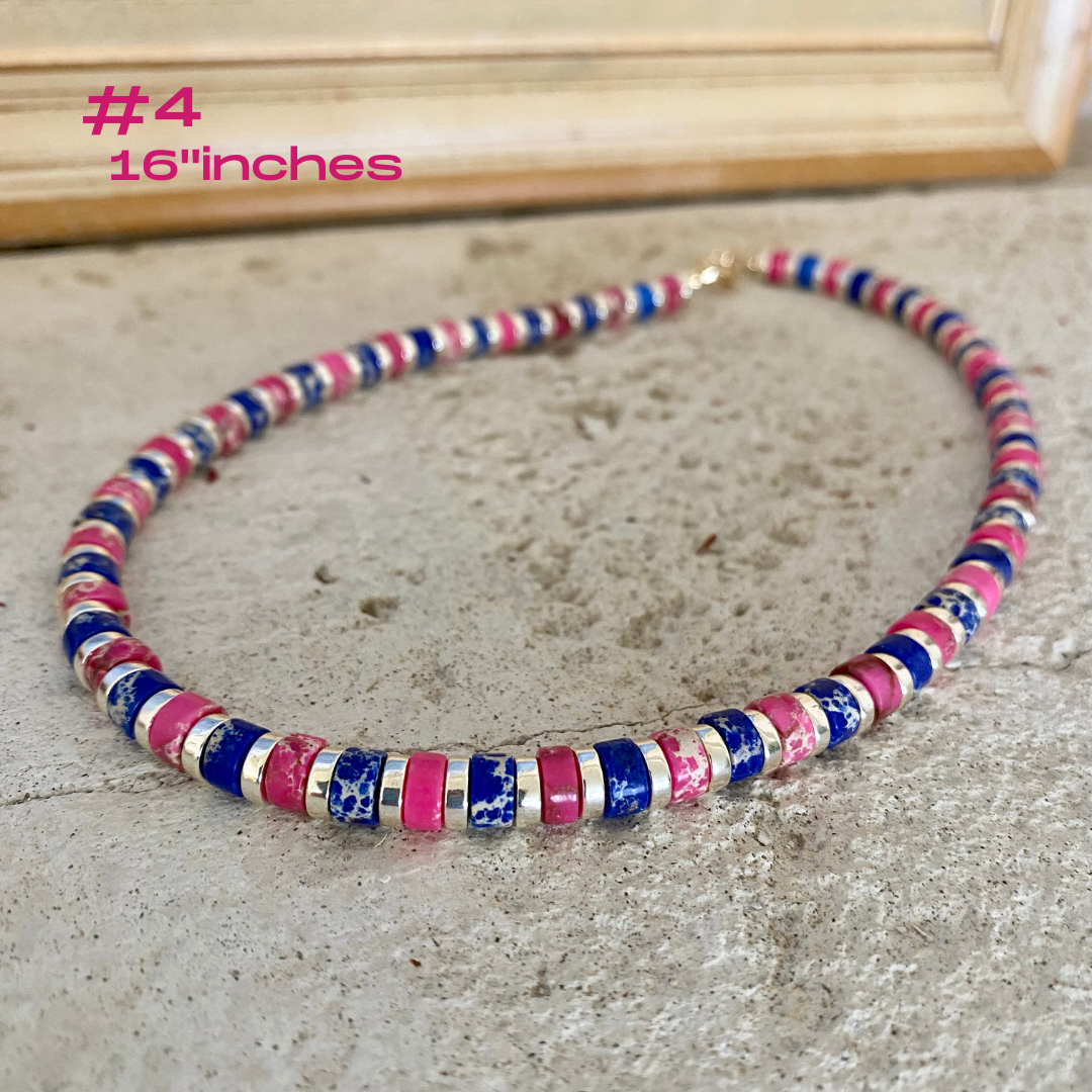 Gemstone choker necklace with multi color beads, featuring vibrant tube-shaped beads in pink and blue hues.