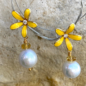 Edison white pearl and yellow citrine drop earrings featuring yellow enamel and gold-plated flower studs. These elegant dangle earrings make a beautiful bridesmaid gift or a special present for her.