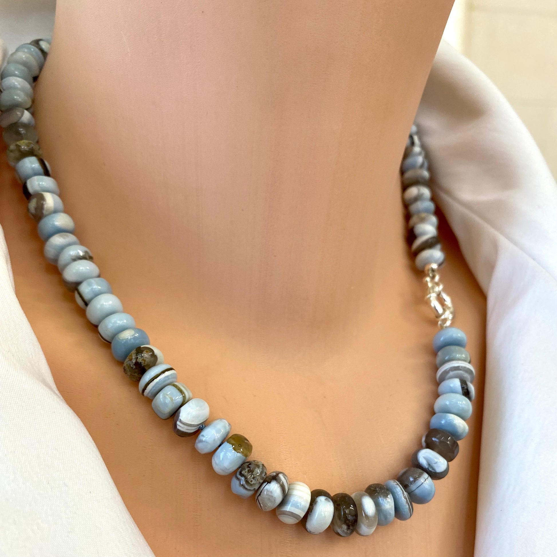 Blue boulder opal candy necklace styled as a short gemstone statement necklace