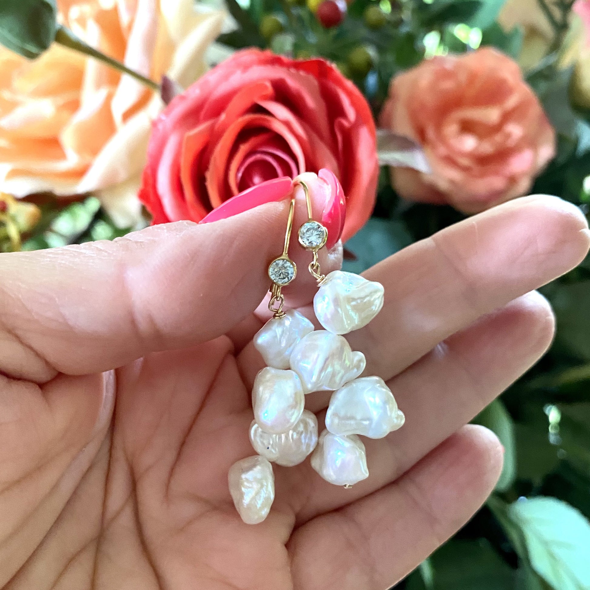 Pearl drop earrings featuring keshi pearls and blue CZ, handcrafted in Canada, perfect for elegant occasions.