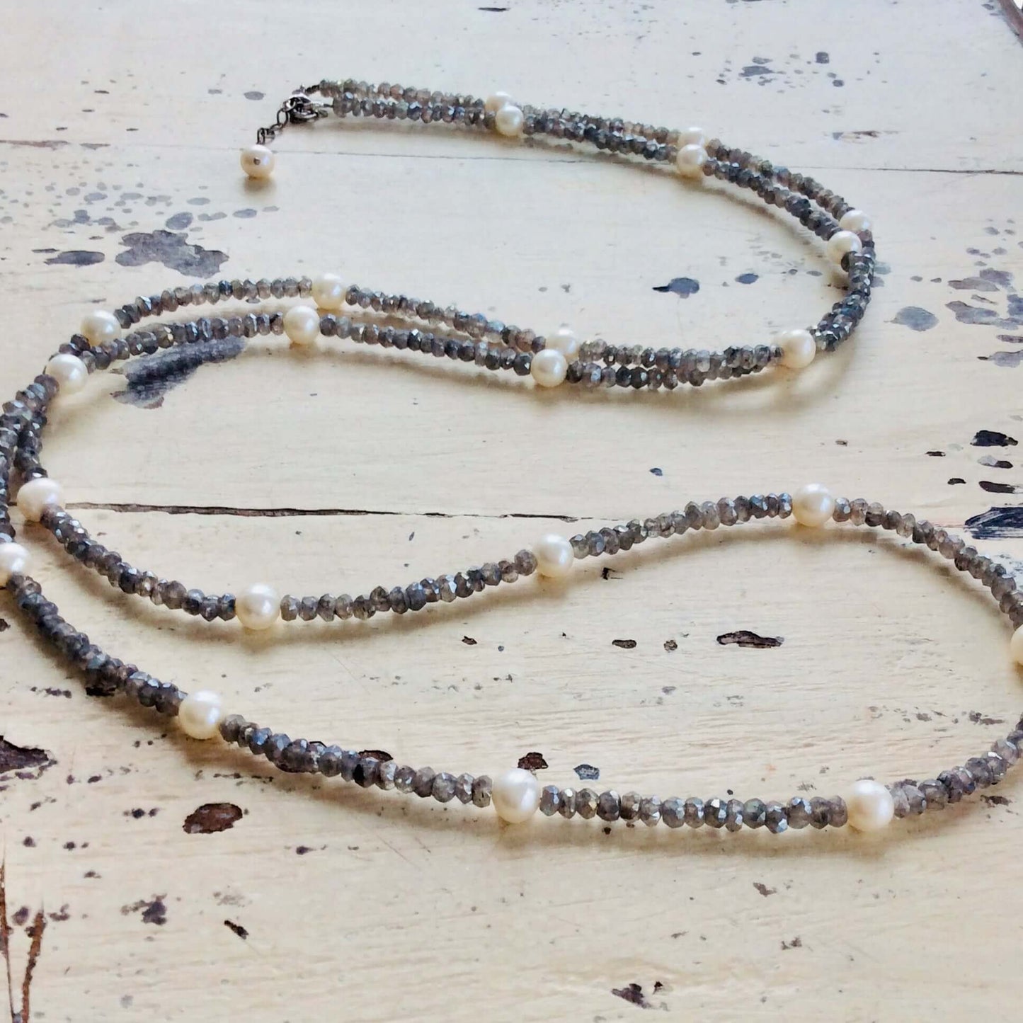 labradorite pearl necklace 40 inches with faceted gemstones and freshwater pearls elegantly displayed.