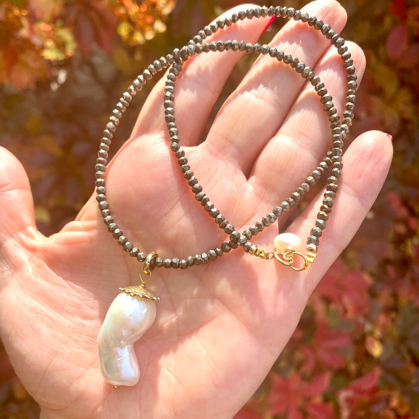 Baroque pearl pendant necklace handmade in Canada with large baroque pearl and bronze details