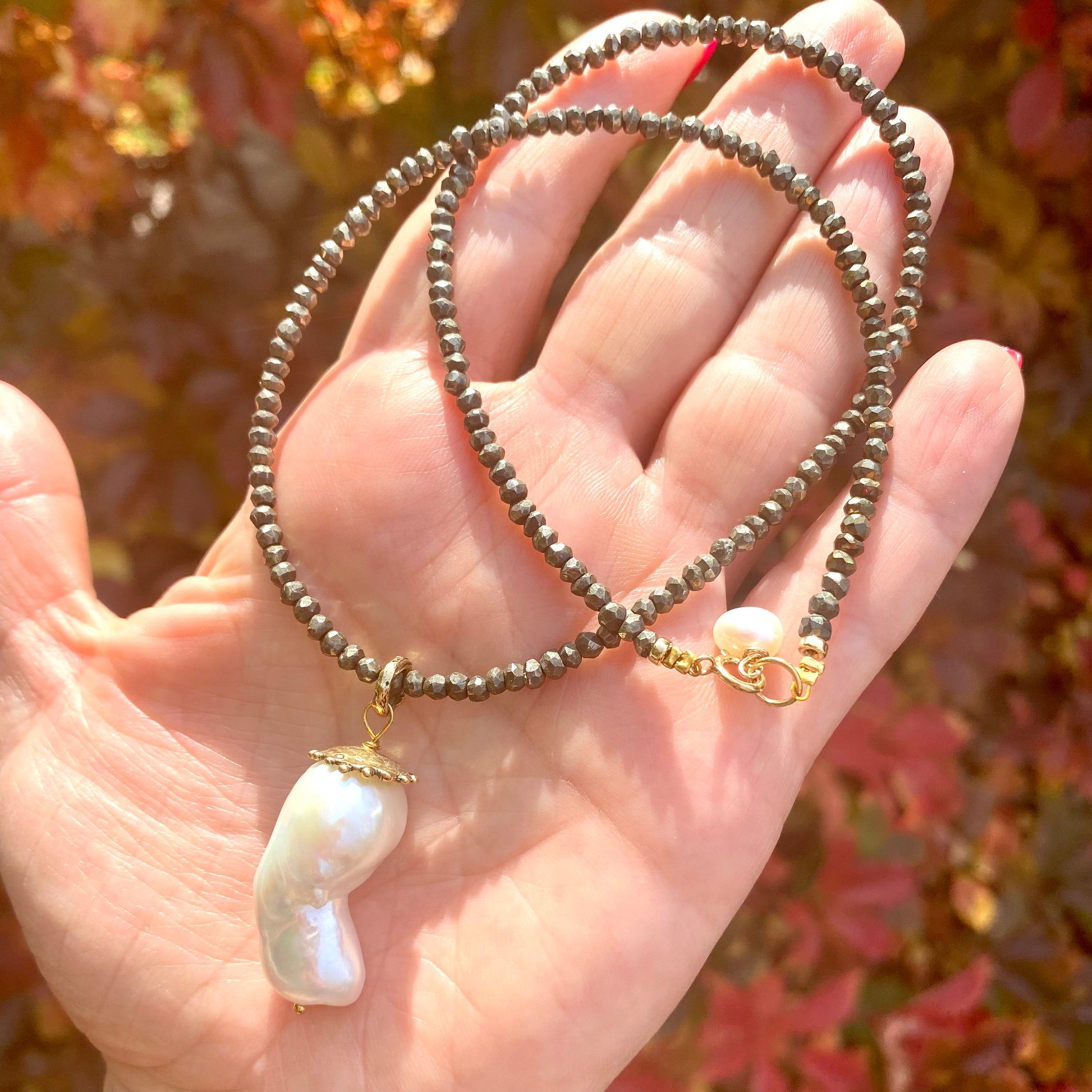 Baroque pearl pendant necklace handmade in Canada with large baroque pearl and bronze details