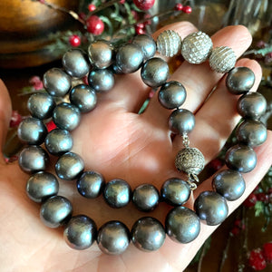 Exquisite Black Pearl Necklace with Silver Details