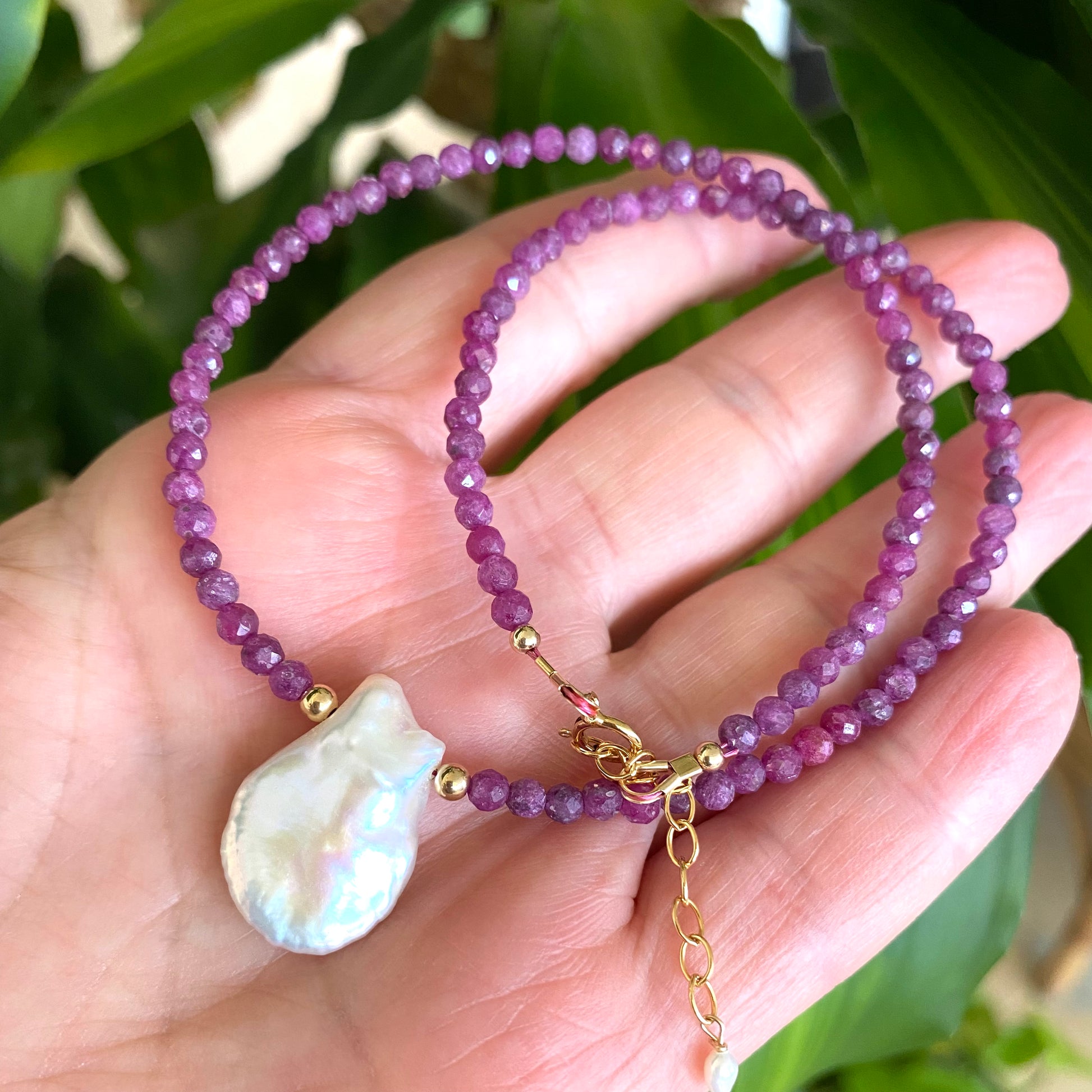 Ruby keshi pearl choker necklace with faceted ruby beads and white keshi pearl handmade in Canada